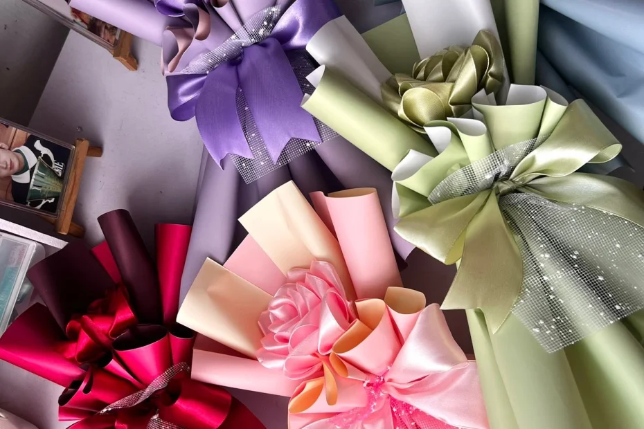 single ribbon rose pink, red, purple, green